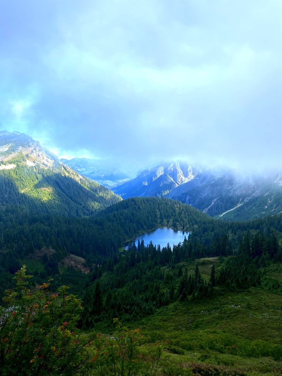 lakes and ridges below clearing clouds, day 120